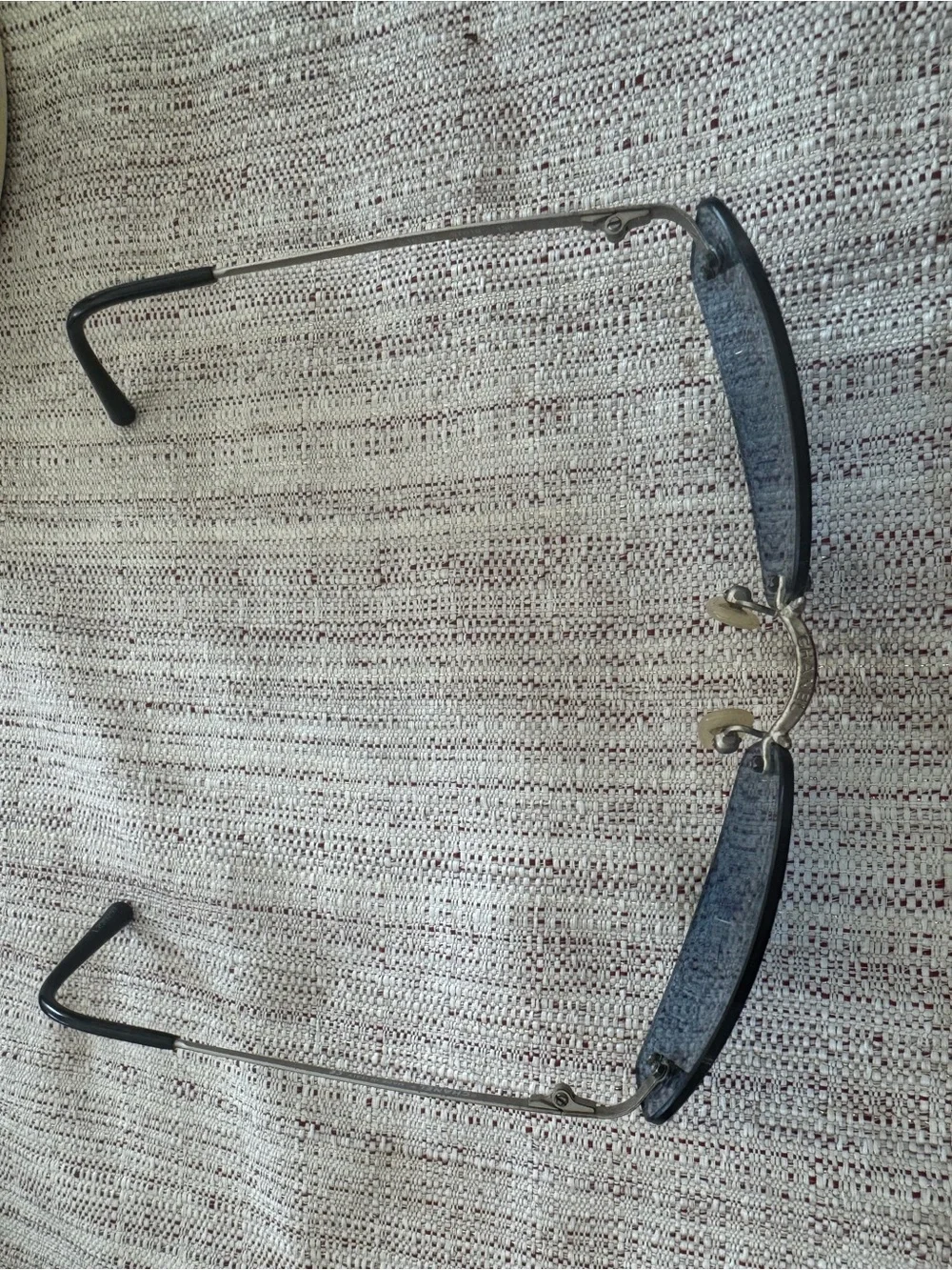CHANEL Rimless Sunglasses with Blue Lenses and Silver Bridge